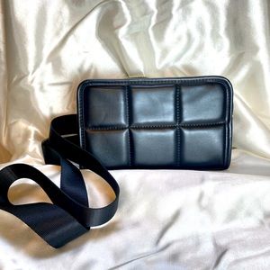 Quilted faux leather belt bag in black